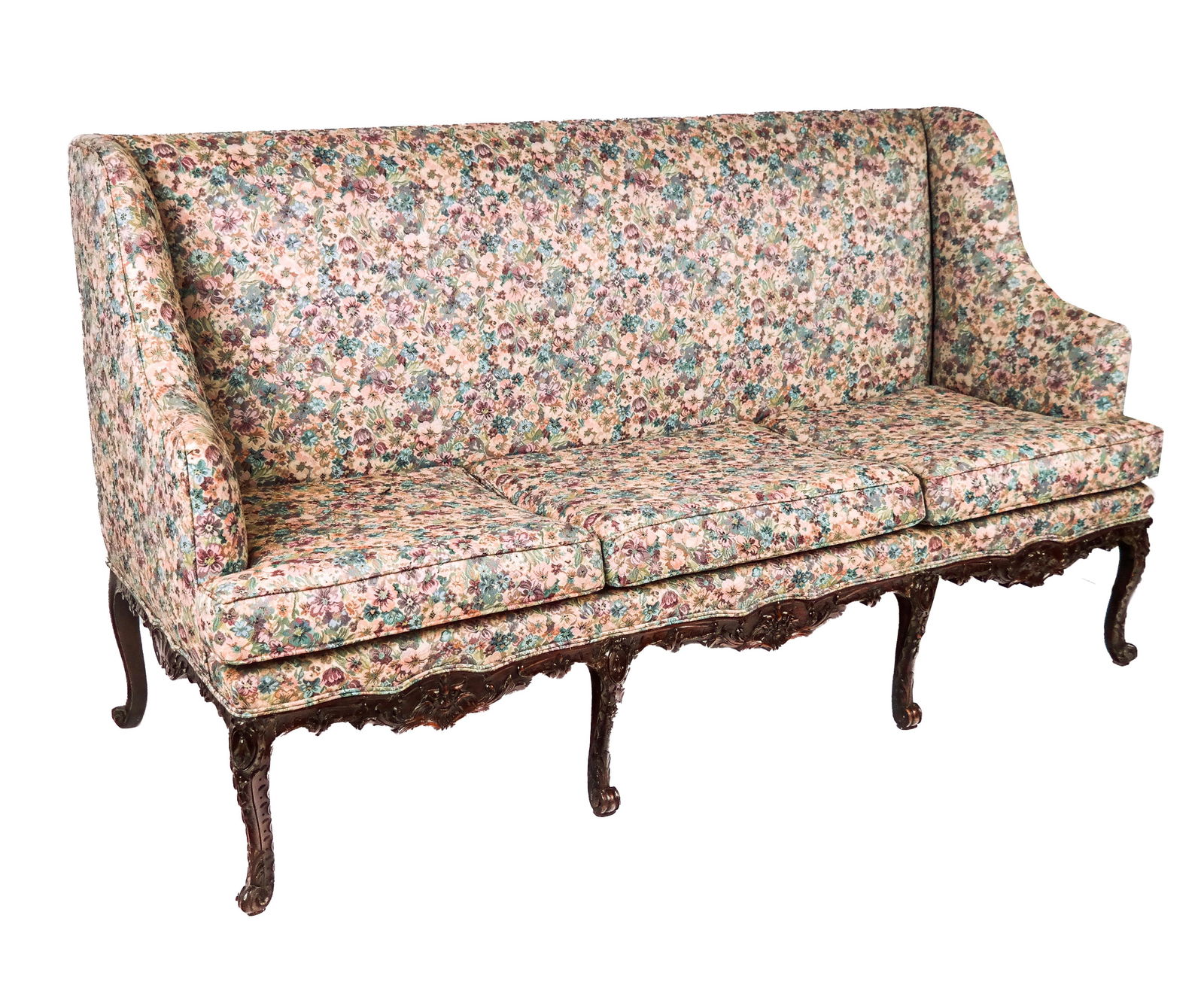 Chintz Upholstered Sofa: Chintz upholstered sofa, 20th century, with a carved apron and six carved cabriole legs. [45" H x 81" W x 31" D; seat height: 21"]. Condition is good with fading to upholstery and scattered repairs to