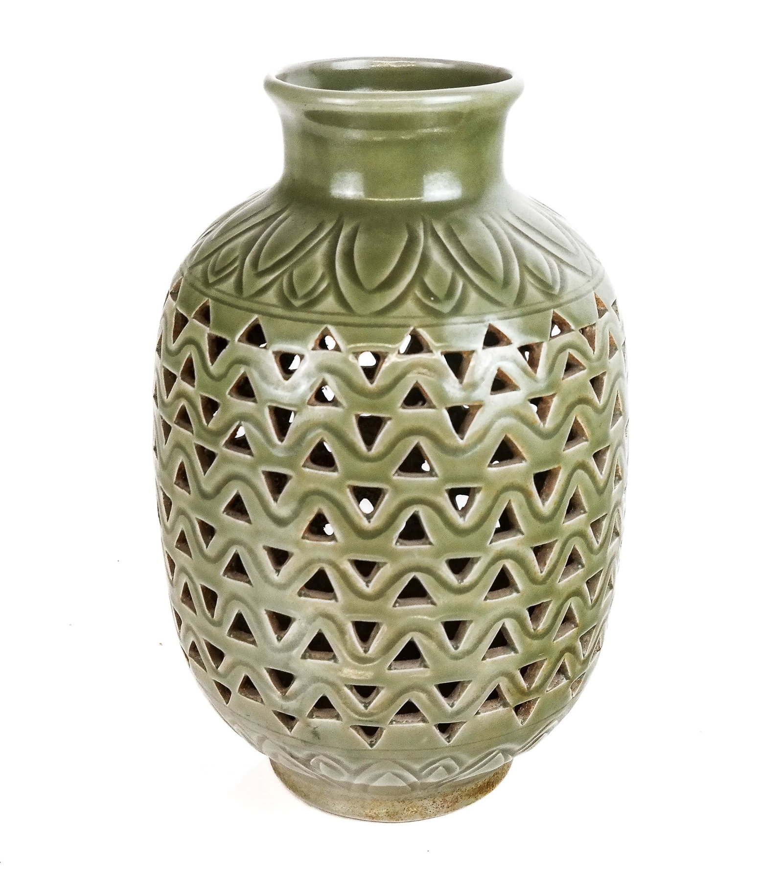 Chinese Pierced Celedon Vase: Chinese pierced celadon vase, 20th century, with a foliate design at upper and alternating triangle design, unmarked. [13" H x 8.25" Diameter]. Condition is good.