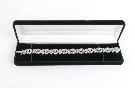 Diamond Bracelet: Diamond flexible bracelet, set with 11 heart-shaped, 132 round brilliant-cut and 22 marquise-cut diamonds, total approximately 16.60 carats, mark to clasp 38797 BlCX, tests for platinum. [28.5 dwt., 7