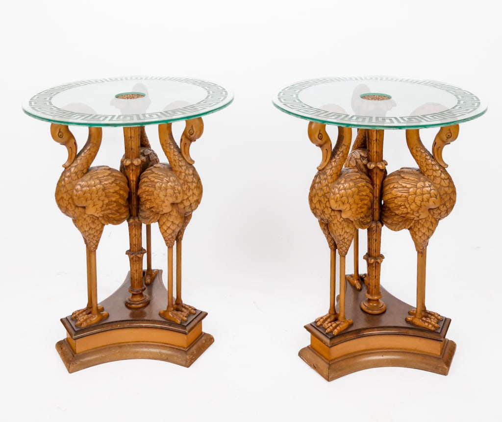 Pair Of Neoclassical Flamingo-Carved Tables: Pair of Neoclassical tables with flamingo-form bases, mid-20th century, with round carved Greek key design glass tops. [29" H x 21" Diameter]. From a New York City collection.