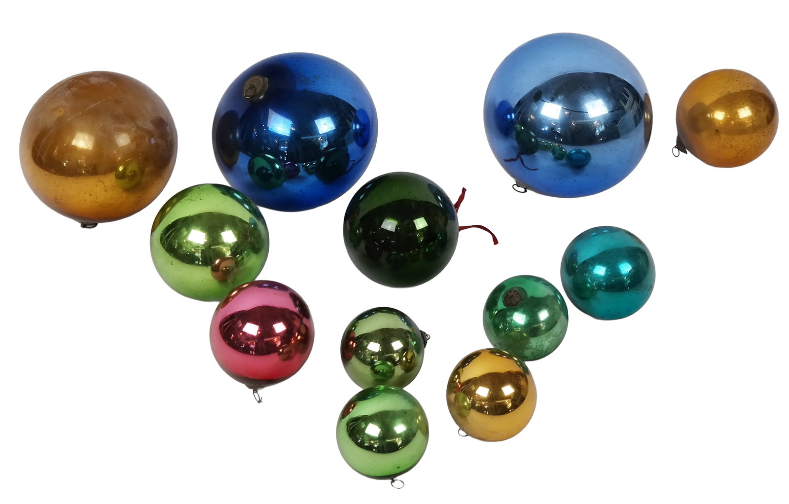Group of Mercury & Other Glass Witch's Balls, 12: Group of 12 mercury glass and colored reflective glass witch's balls in various sizes in blues, greens, golds and one red. [Range: 11" Diameter to 4.5" Diameter]. Overall condition is good, some with 