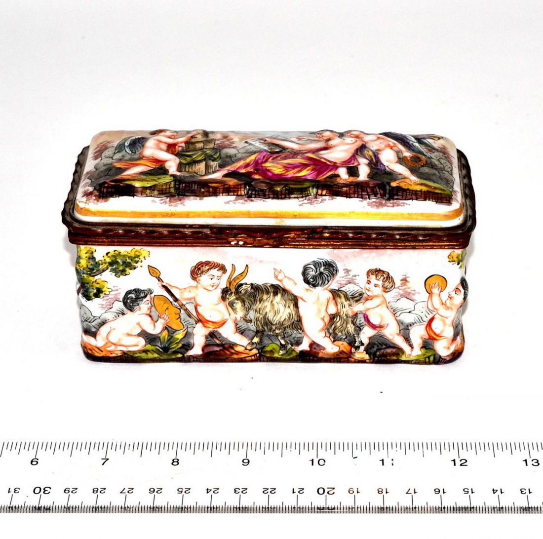 Capodimonte Cherub Box: Italian porcelain box, raised cherub and figural decor. Appears to have been restored. [6" x 3" x 3"].