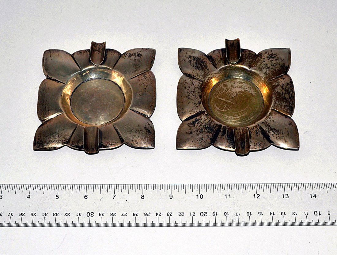 Pair of Mexican Sterling Ash Receivers - 7.3 ozt.: Art deco flower-form ash receivers. [4" W x 5" D x 3 3/4" H] 7.3 ozt.