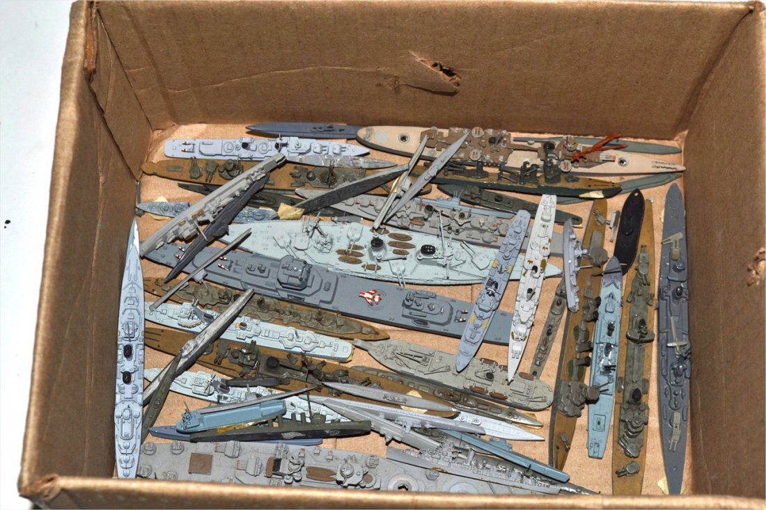 Collection of 40+ Water-Line Ship Models: Scale models [from 3/4" L to 8" L], mostly diecast metal with some wood examples. Includes: destroyer, cruisers, submarines, and others. Spans 19th through 20th C. [Including U.S.S. Monitor]. As is, s