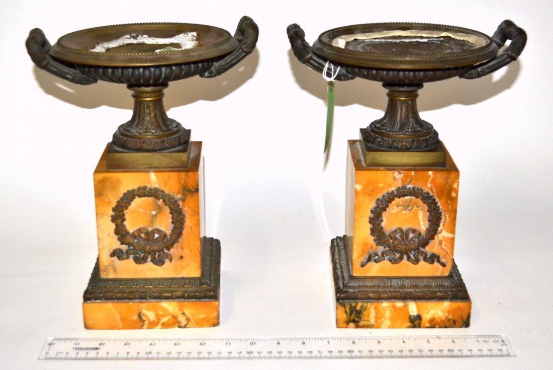 Pair of Empire Bronze Tazzas: Pair of Empire bronze and marble tazzas, ribbon decor. Tops need cleaning, otherwise in good condition. [9 1/4" x 12" H]