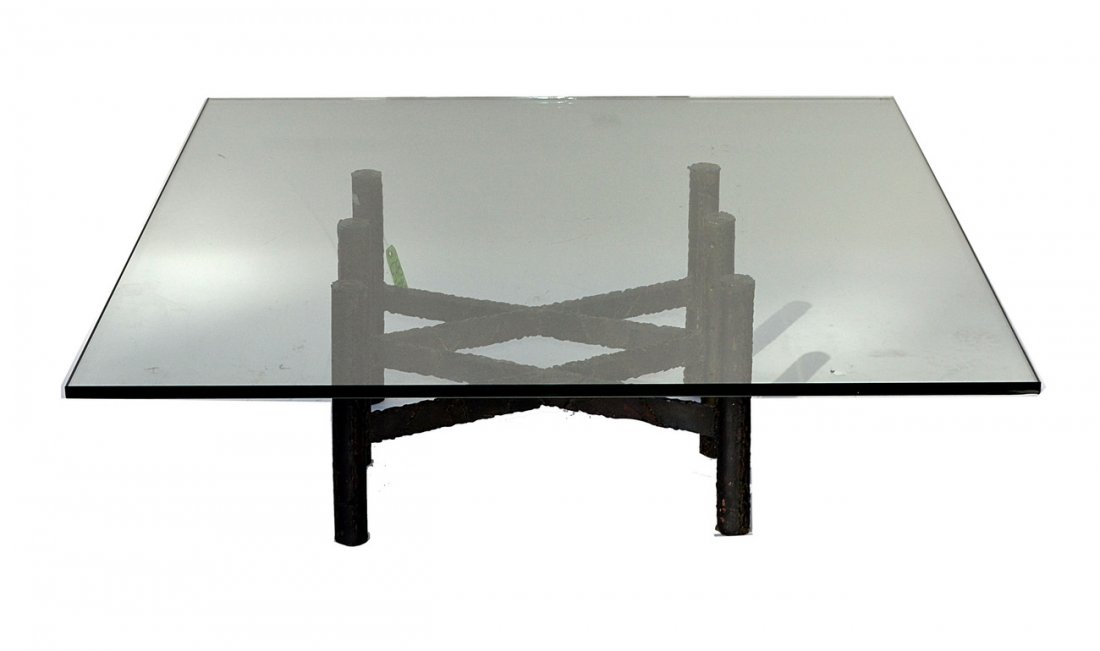 Modern "Brutalist" Style Cocktail Table: Glass top cocktail table with sculptural welded steel base composed of six cylindrical supports with cross-stretchers. 48" Sq. x 16" High. Top bears some chips.