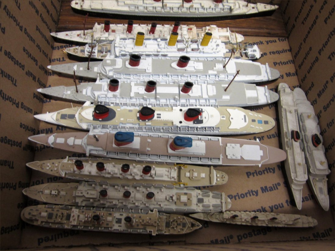 Collection of 13 Die-Cast Metal Ocean Liner Models: Water-Line models [vintage and contemporary] including ships: Conte Grande, Paris, Mauritania, United States, Queen Mary, Imperator, and others. Manufactures include: Mercator, Tri-Ang, and others. As