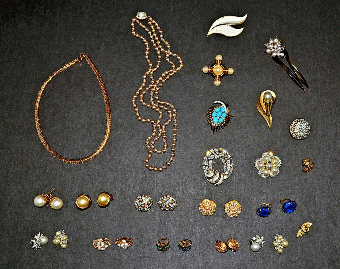 Assorted Designer Costume Jewelry & Others: Comprises: necklaces, earrings, pins, and others. INcludes: Trifari, Vogue, Carolee, Marvella, and others. 21 items.