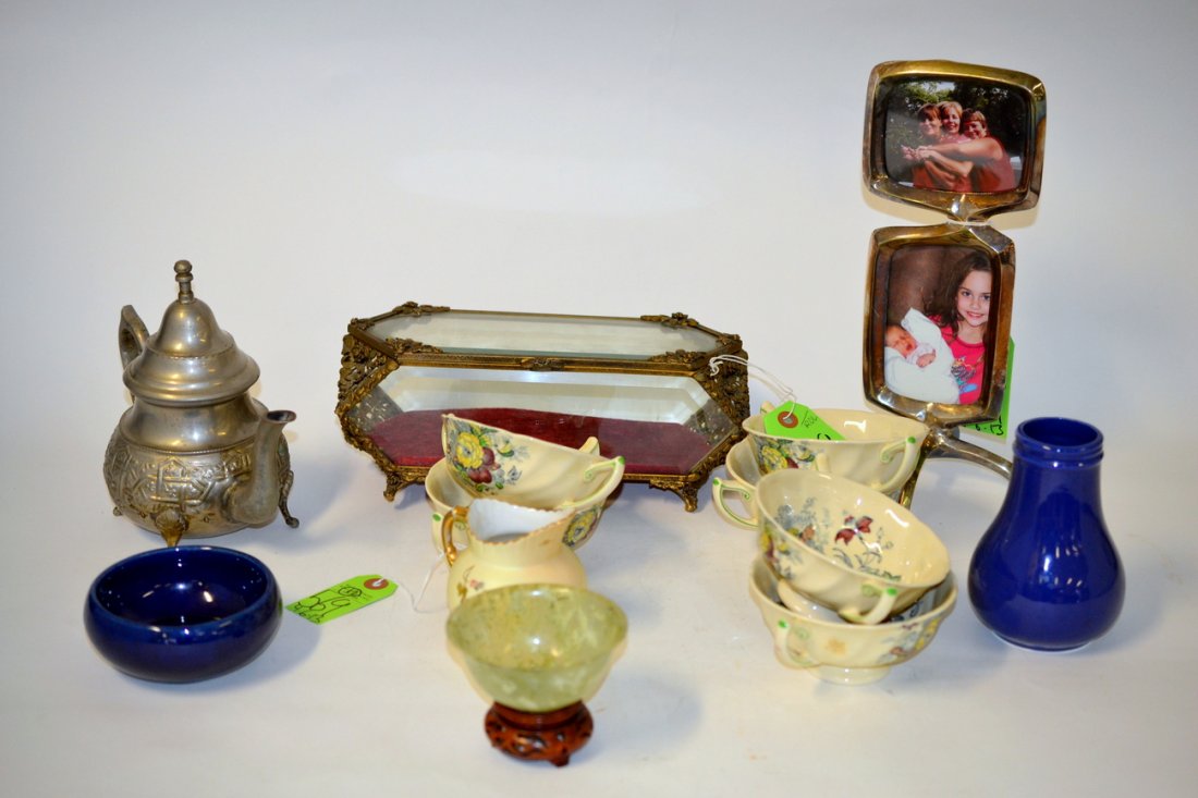 Assorted Decorative Objects [12 Items]: Comprises: 1.) Set of six Royal Doulton "Kirkwood" Boullion cups. 2.) Modern silverplate two photo picture frame. 3.) Vintage oblong glass and brass jewelry box. 4.) Indian tea pot. 5.) Fiestaware and