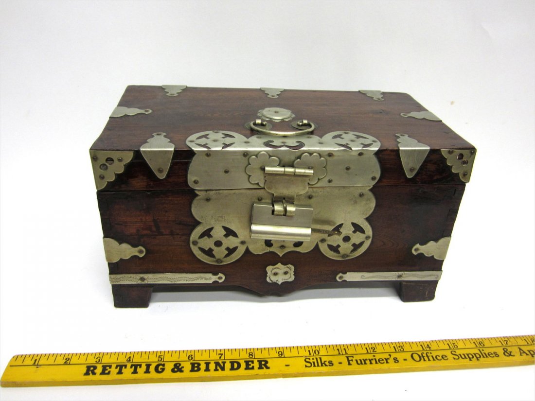 Antique Japanese Cherry Wood Box: Features decorative strapwork mounts and slot lock with key. Interior bears removable tray with storage below. Back left bracket foot missing. [12 1/2" x 6 1/2" x 6 1/2"]