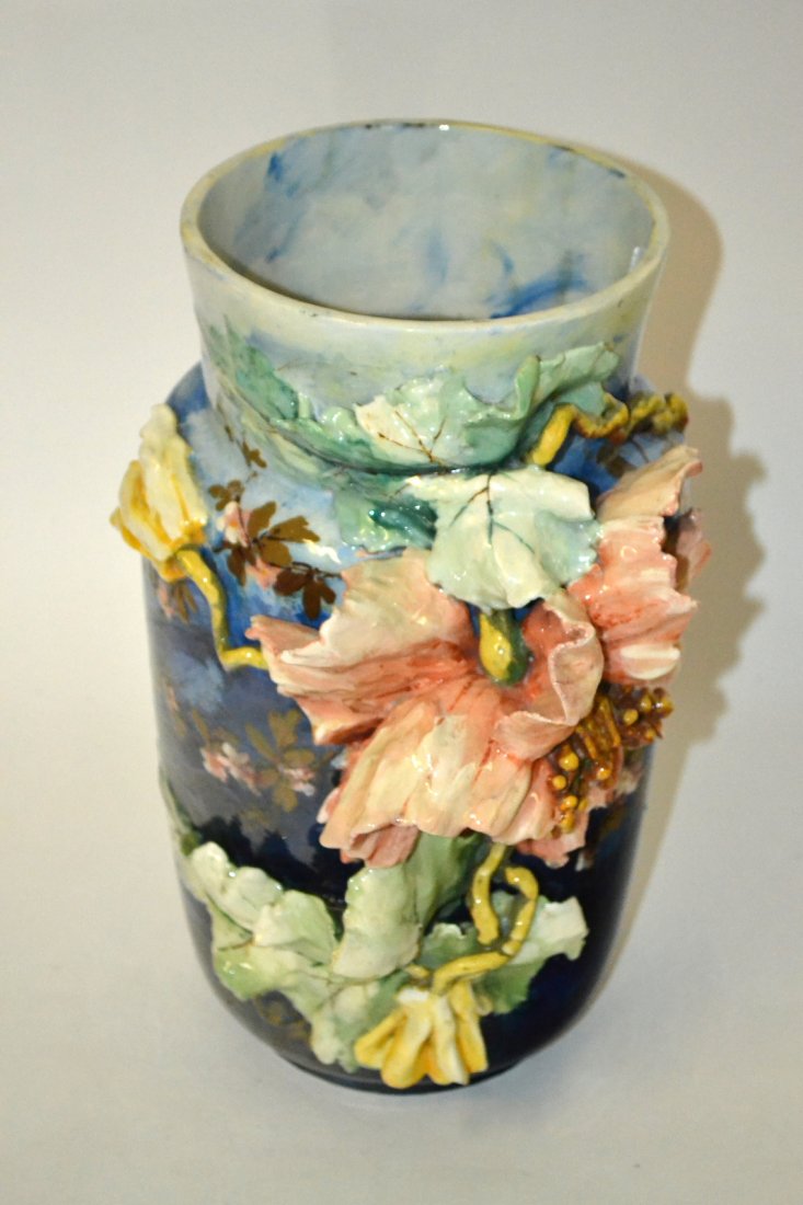 Attributed to Jerome Massier Vase: French ceramic blue and green floral raised porcelain vase. In good condition. [14" H x 6 1/2" Dia]
