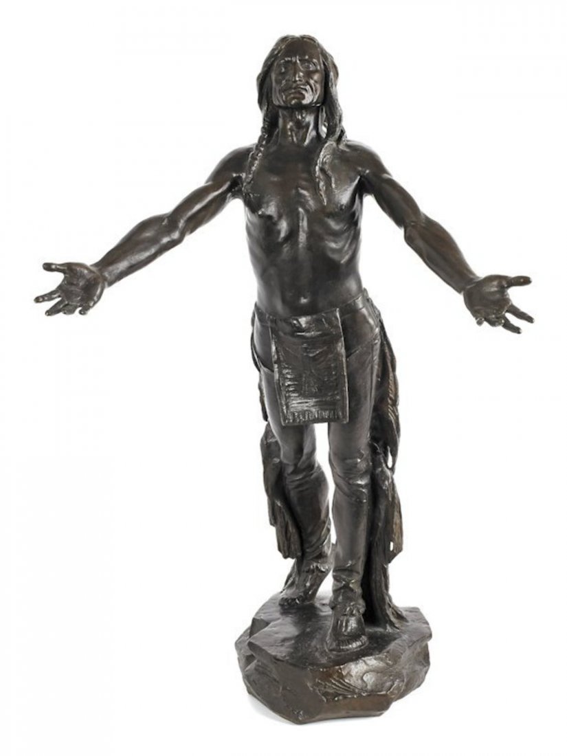 Charles Henry Humphriss - Bronze Indian Hands: Antique American Bronze statue of an American Indian with outstretched arms. Muscular, with totem eagle etched on the apron, long hair, standing on the rock. Signed Charles Henry Humphriss and dated 1