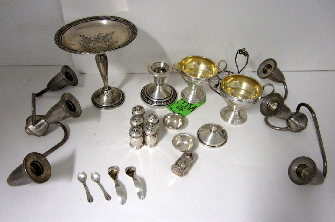 Miscellaneous Sterling Silver Articles: Comprises of multiple weighted items including candelabra tops, cream and sugar set, footed dish, and candle holders. Non weighted items include shakers, condiment spoons, and others. 20 items total. 