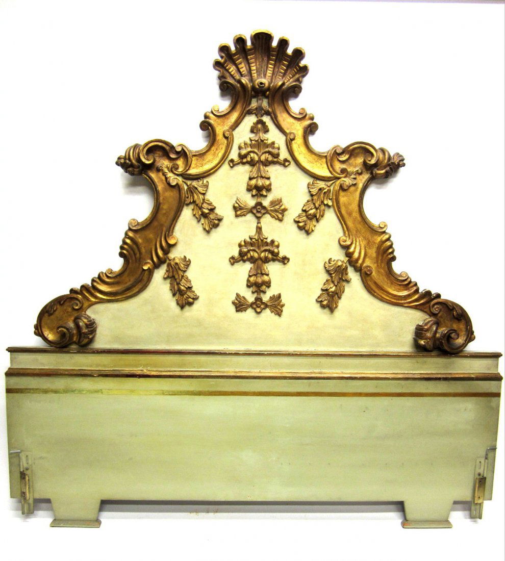 Painted, Decorated and Carved Headboard: A Louis XV style green and gilt painted headboard. 80"H x 77 1/2"H.
