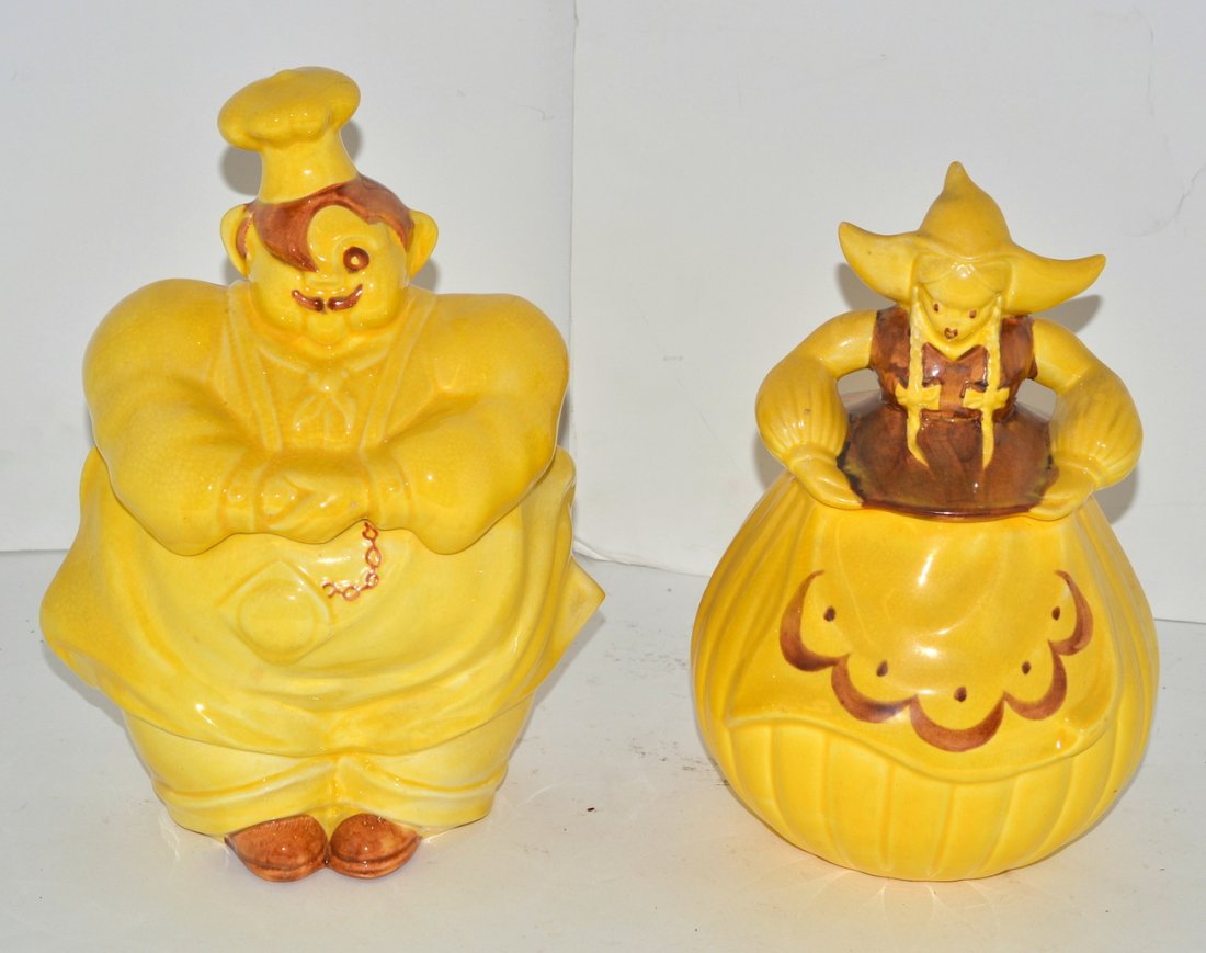 Pair of Vintage Redwing Pottery Cookie Jars: Both yellow glazed ceramic figural cookie jars. Signed "Redwing" on bottom. Comprises: 1) Whimsical rotund chef. 8 1/2"W x 6 1/2"D x 11 1/4"H. 2) Dutch maiden in tri-point hat. 7 1/4"W x 7 1/2"D x 10