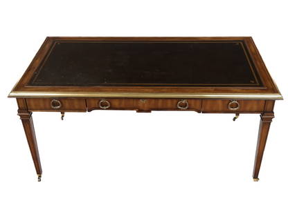 Neoclassical Bureau Plat by Sligh: Neoclassical mahogany and leather top bureau plat by Sligh Furniture, American 20th century, with Greek key design to writing bad, brass mounts, three drawers and tapered legs, marked Sligh, Holland M