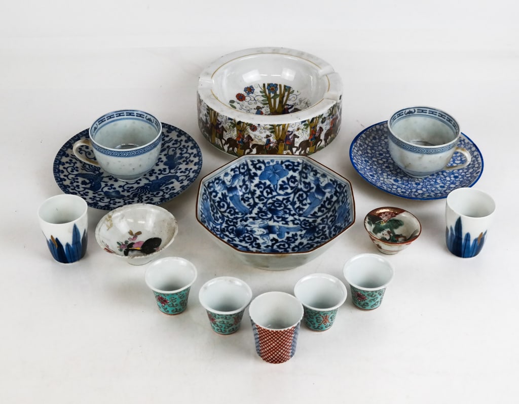 Assorted Chinese and Japanese Porcelain Articles: Assorted Chinese and Japanese porcelain wares, 20th century comprising an octagonal blue and white and figural decorated bowl with a Chinese mark to base, two figural sake or tea cups the smaller mark
