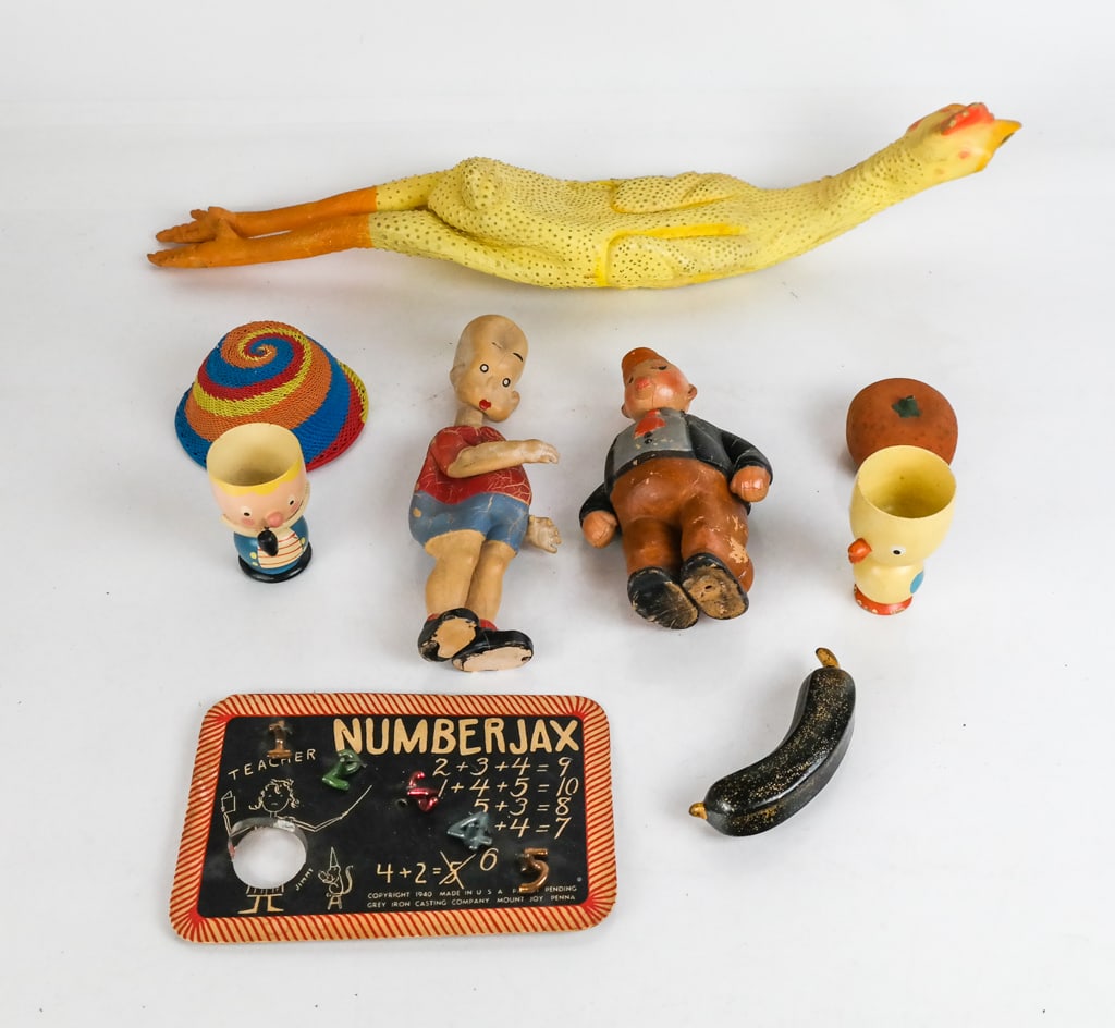 Assorted Vintage Toys: Vintage toys comprising an Irwin "Henry" rubber doll, circa 1930, a J. Wellington Wimpy rubber doll from King Features Syndicate, marked and dated 1935, a rubber chicken, a set of Numberjax, a woven d