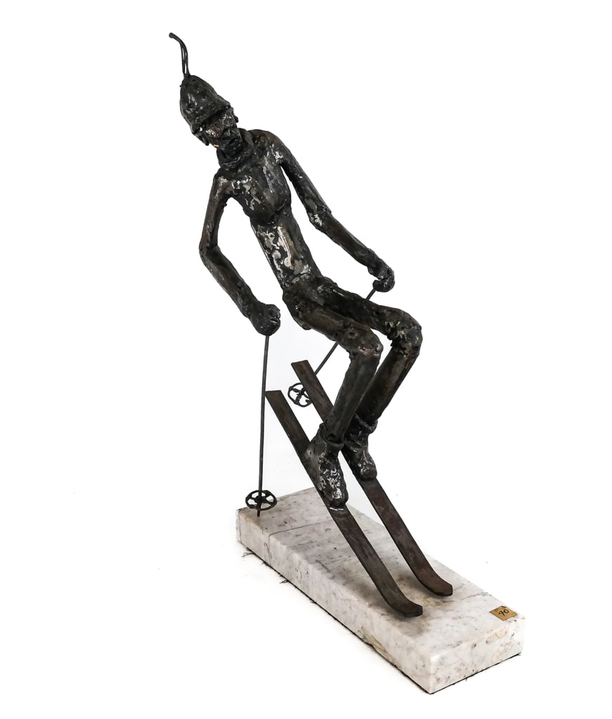 Edward GOLDSTEIN Brutalist Figure of Skier: Edward Goldstein (American) Brutalist welded metal figure of a skier, mounted on a marble base, circa 1986, unsigned [18" H x 16" L x 6" W]. Overall condition is good, oxidation to metal and scratches