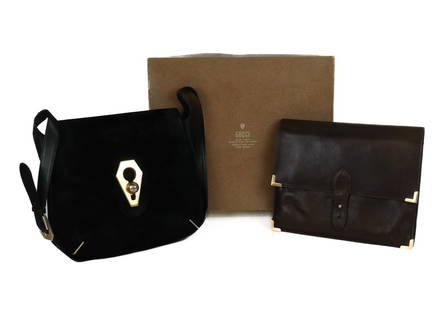 Two Vintage Gucci Handbags: Two vintage Gucci handbags including a black suede handbag with gold tone hardware, and a black suede coin purse, and a brown leather bag with accordian compartments to interior, both marked Gucci, an