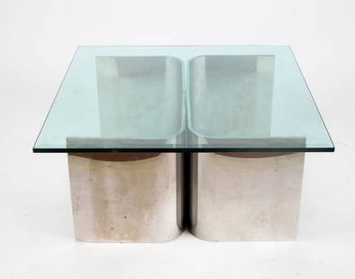 Post Modern Chrome and Beveled Glass Coffee Table: Post Modern chrome and beveled glass coffee table, probably 1970s. [16" H x 36" Square]. Overall condition is good/fair, natural scratches to chrome base, bolts for base deficient.