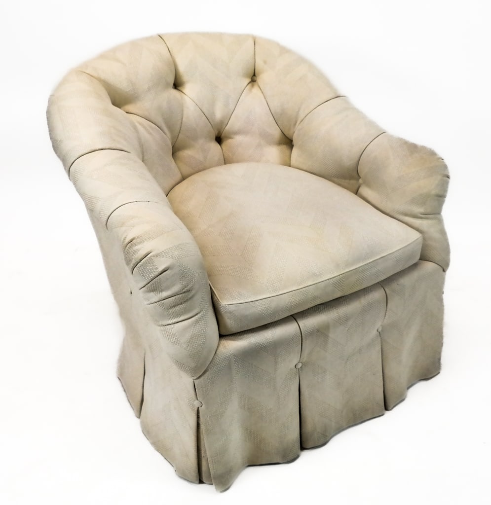 Cream Tufted and Upholstered Club Chair: Cream tufted and upholstered club chair with scroll arms and pleats. [32" H x 31.5" W x 32" D, 21" Height to seat]. Overall condition is good.