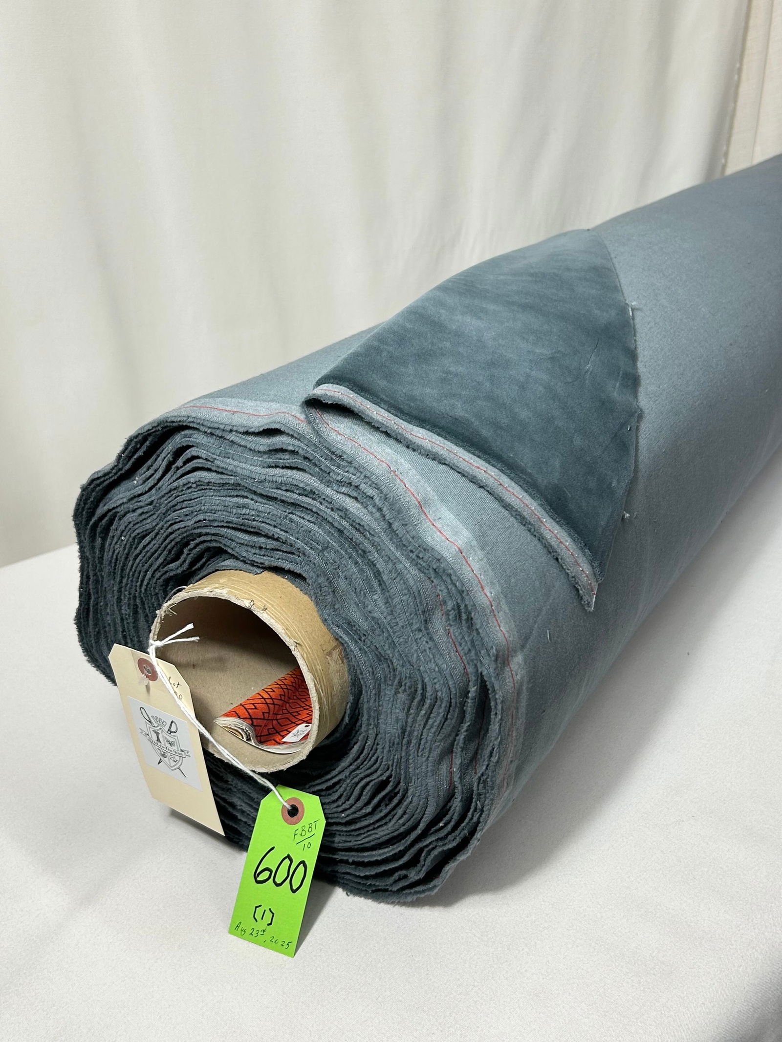 European Indigo Blue Cotton Plush Fabric: 20 yards of heavy cotton-faced smoky blue plush velvet for upholstery, 56" width. The multi-purpose quality has an irresistibly soft hand. Minor wrinkling and in good condition.
