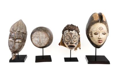 4 Carved & Painted African Masks on Stands