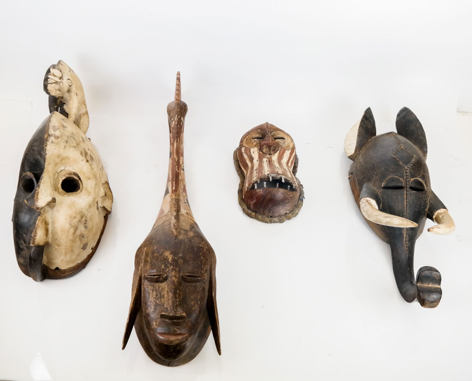 4 Hand-Carved African Animal Masks (1 of 11)