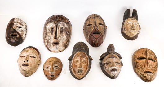 Group of 9 Carved & Painted African Masks