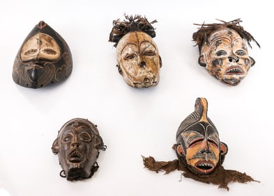 Group of 5 Carved & Decorated African Masks
