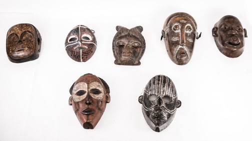Group of 7 Hand-Carved African Masks