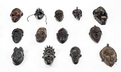 Large Collection of Carved African Masks (13)