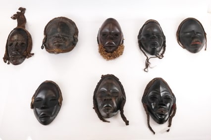 8 Carved & Decorated African Dan Masks