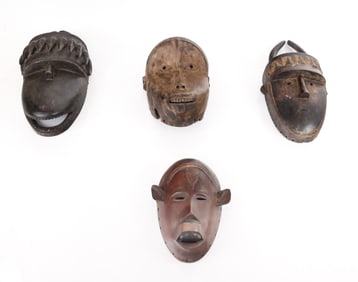 Group of 4 Carved African Animal Masks