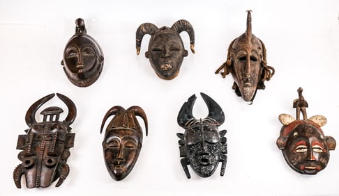 Group of 7 Intricately Carved African Masks
