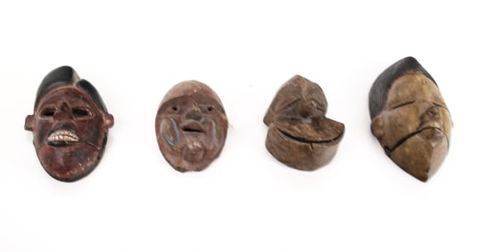 4 Diminutive Carved African Masks