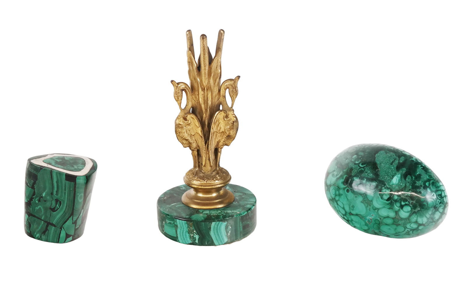 Malachite Desk Accessories, 3: Three malachite desk accessories comprising a malachite egg, a malachite and bone paperweight, and a bronze dore heron form pen stand on a malachite base. [Pen stand: 6" H x 3" Diameter]. Condition is