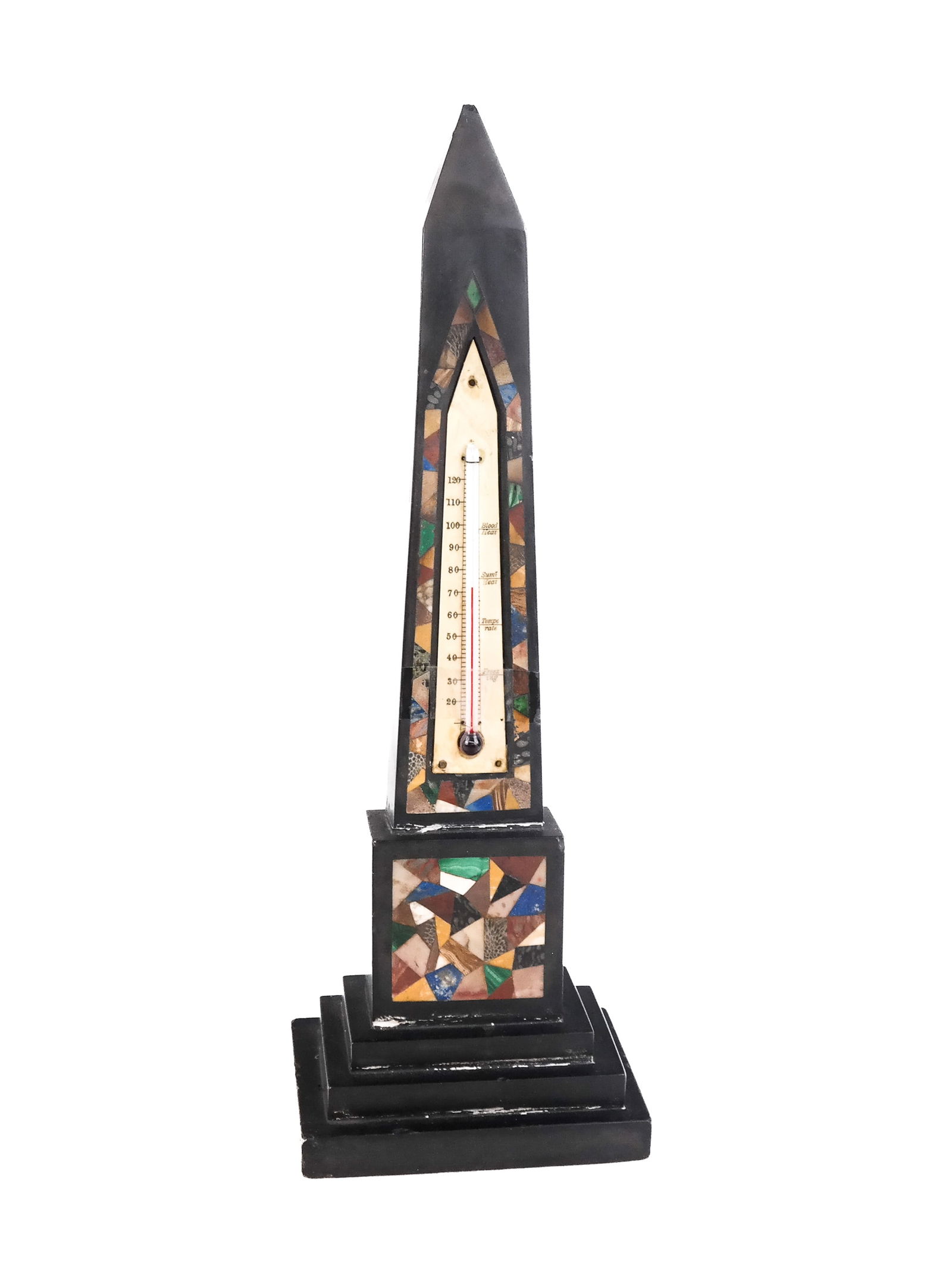 Stone Inlaid Obelisk Form Thermometer: Stone inlaid black stone obelisk form thermometer, 19th century, with a thermometer mounted on inscribed bone surrounded by inlaid stones on a base with inlaid stones and stepped lower. [15" H x 5.25"