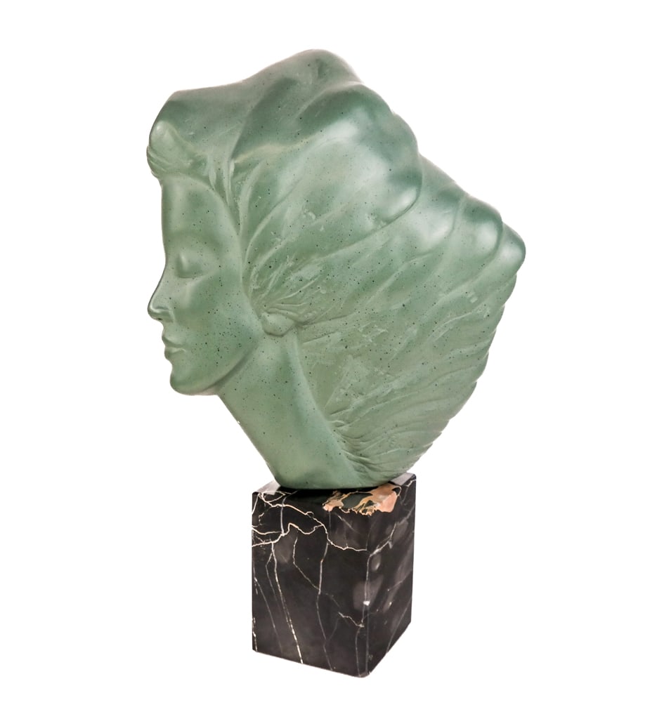 Peggy MACH Female Bust, Bronze and Marble: Peggy Mach (American) art deco style female bust, bronze bust with green patina, resting on a rectangular marble base, signed and dated to back " Peggy Mach AMR 1971". [16' H X 18" W x 5" D]. Overall