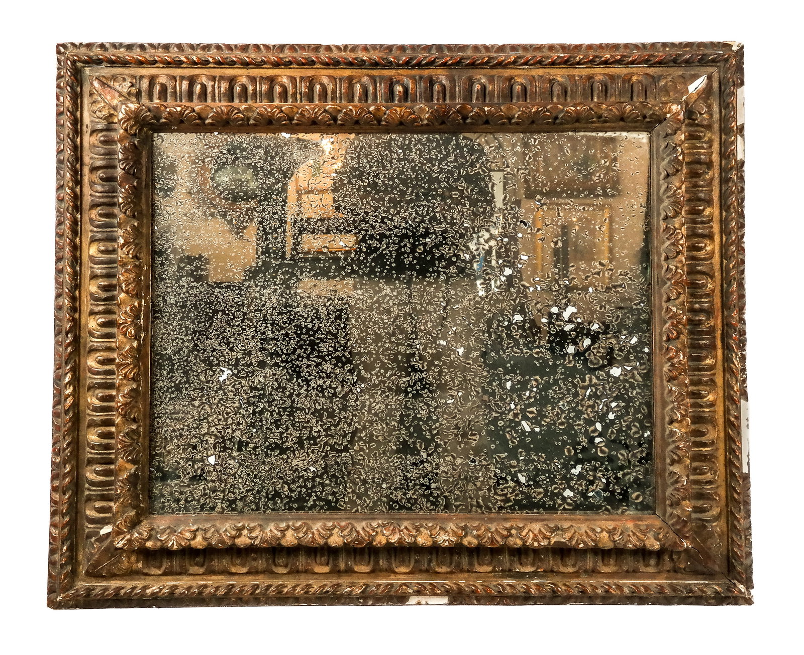 Continental Carved Giltwood Mirror: Continental carved giltwood mirror, late 19th century, with original glass. [39.5" H x 34" W x 3" D]. Overall condition is fair, with losses.