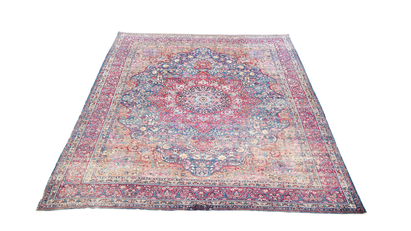 Persian Style Rug: Persian Style Rug with all-over decoration and deep red and blue ground. [138" x 113"]. Areas of wear.