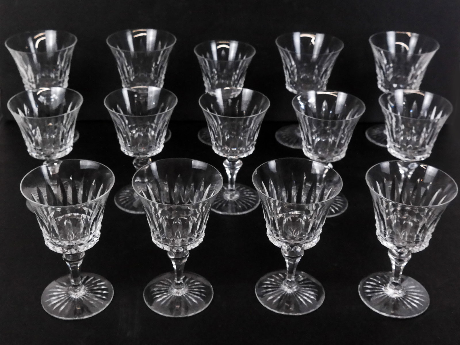 Baccarat "Piccadilly" Wine Glasses: Baccarat "Piccadilly" wine glasses comprising four red wine glasses, and ten white wine glasses, all marked Baccarat. [Red wines: 6" H x 3.75" Diameter]. Condition is good to fair with fleabites and m