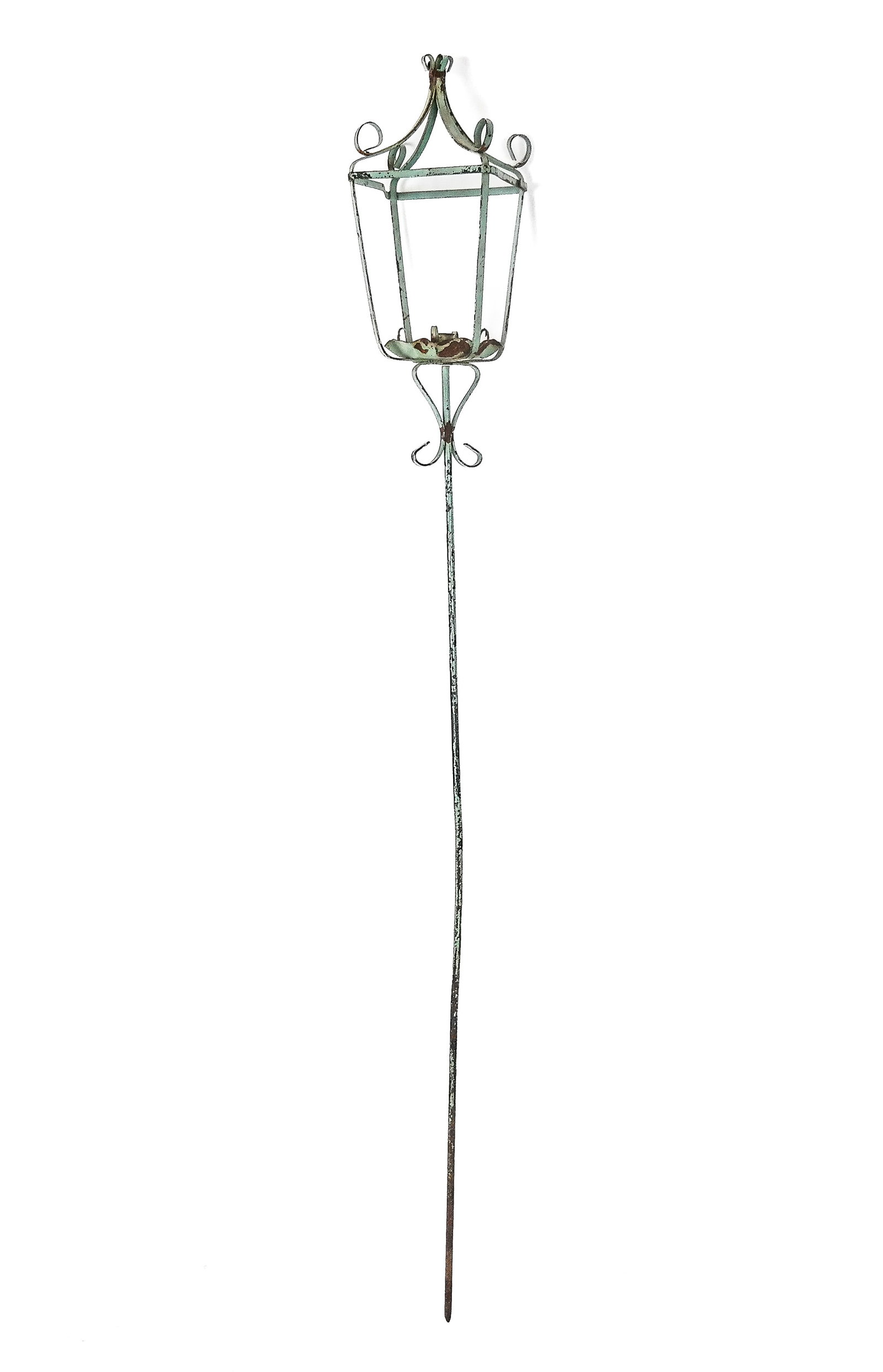 Painted Metal Torchiere: Bue painted metal garden torchiere. [61" H x 7.25" Square]. Overall condition is fair, metal bent and shade deficient.