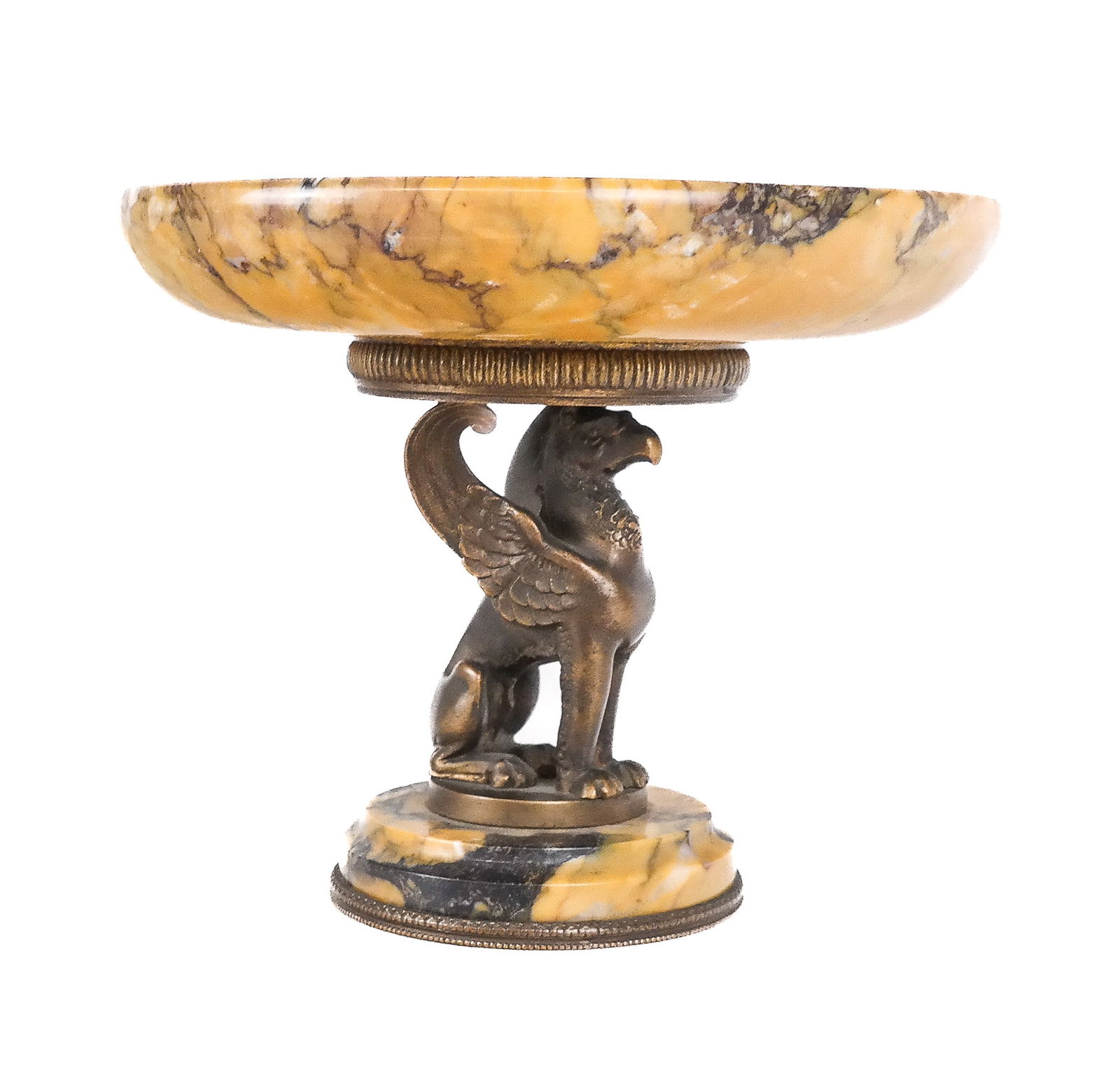 Siena Marble and Gilt Bronze Tazza: Siena marble and gilt bronze tazza with a griffin form stand and bronze trim to lower, marked Made in France to base, and retailed by Ovington Brothers with mark to rear stand. [5.25" H x 6.25" Diamet