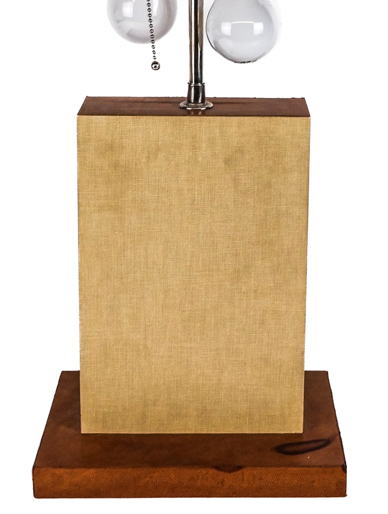 Modern Leather Mounted Lamp: Moden leather and fabric mounted lamp, 20th century, likely from R & Y Augousti Paris, with a chromed metal finial, unmarked. [To finial: 23" H x 10" W x 7" D]. Condition is good with some discolorati