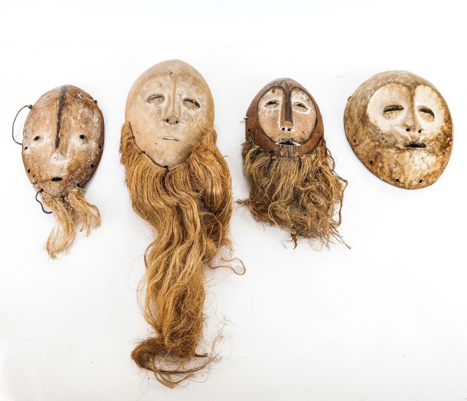 Group of 4 Bearded Lega African Masks (1 of 16)