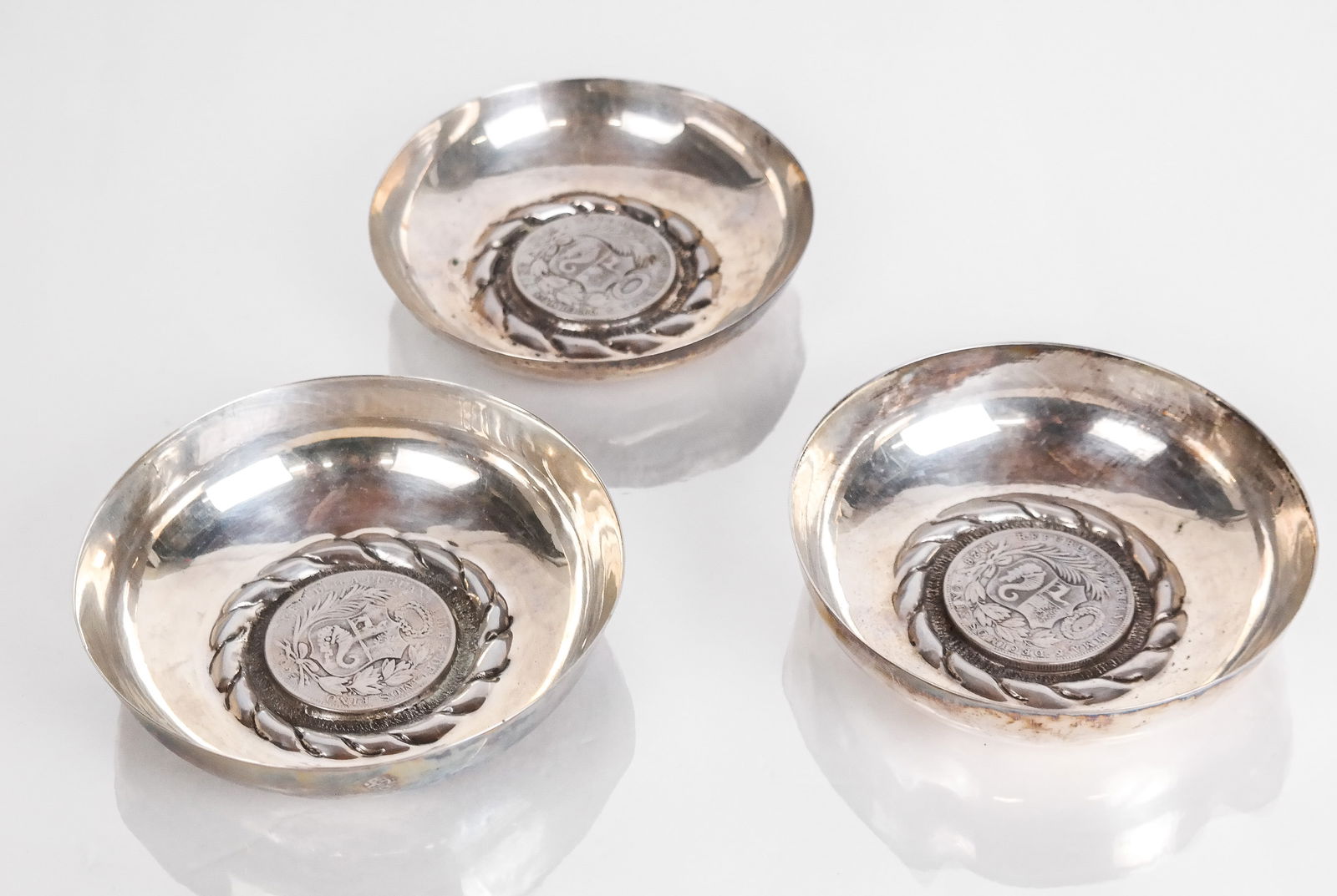 Three Peruvian Coin and Silver Dishes (1 of 6)