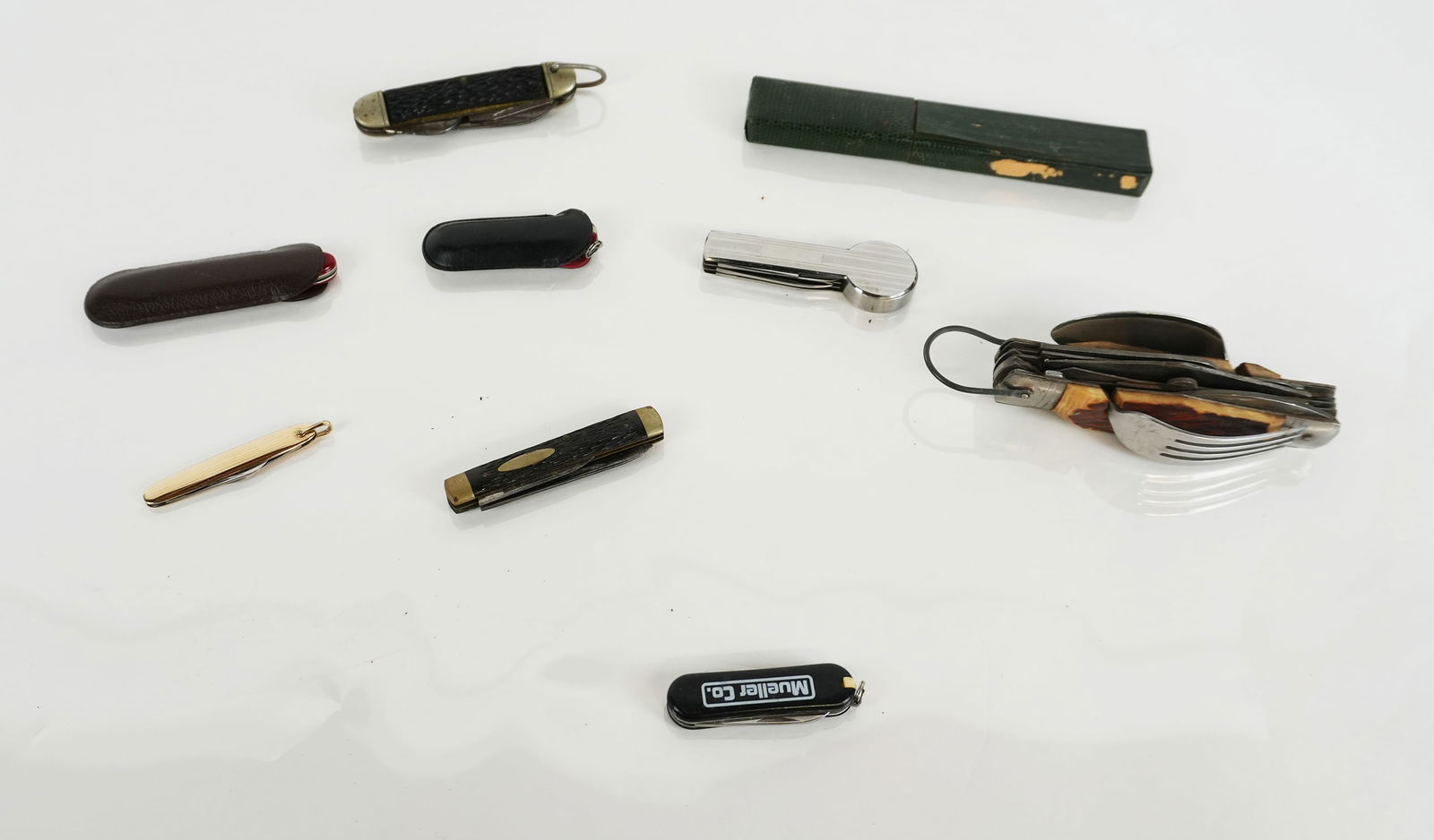 Collection of Folding Knives, Blades, and Forks, 9: Collection of assorted folding knives, forks, and blades, comprising a Hoffritz 2 blade Swiss Army pocket knife, 2 small 2 blade pocket knives made in China with toothpicks, a Jenbrolaget single blade
