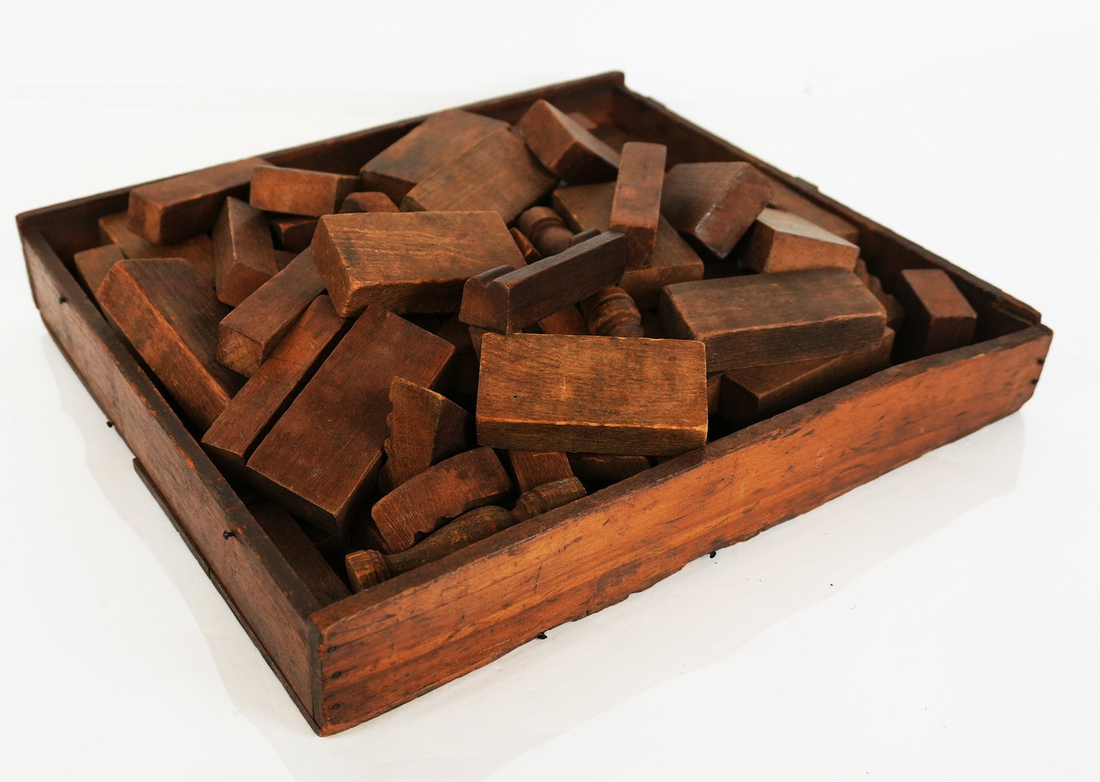 Group of Antique Wooden Blocks: Group of antique wooden blocks including turned wood and carved pieces. Condition is good with minor wear commensurate with age. From the collection of Sue and Cliff Freeman.